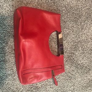Red clutch bag. The limited. New with tags